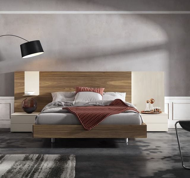Robeyan Interiorismo dormitorio con cama doble y lampara
